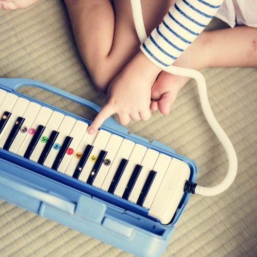 Girl palying piano music toy equipment